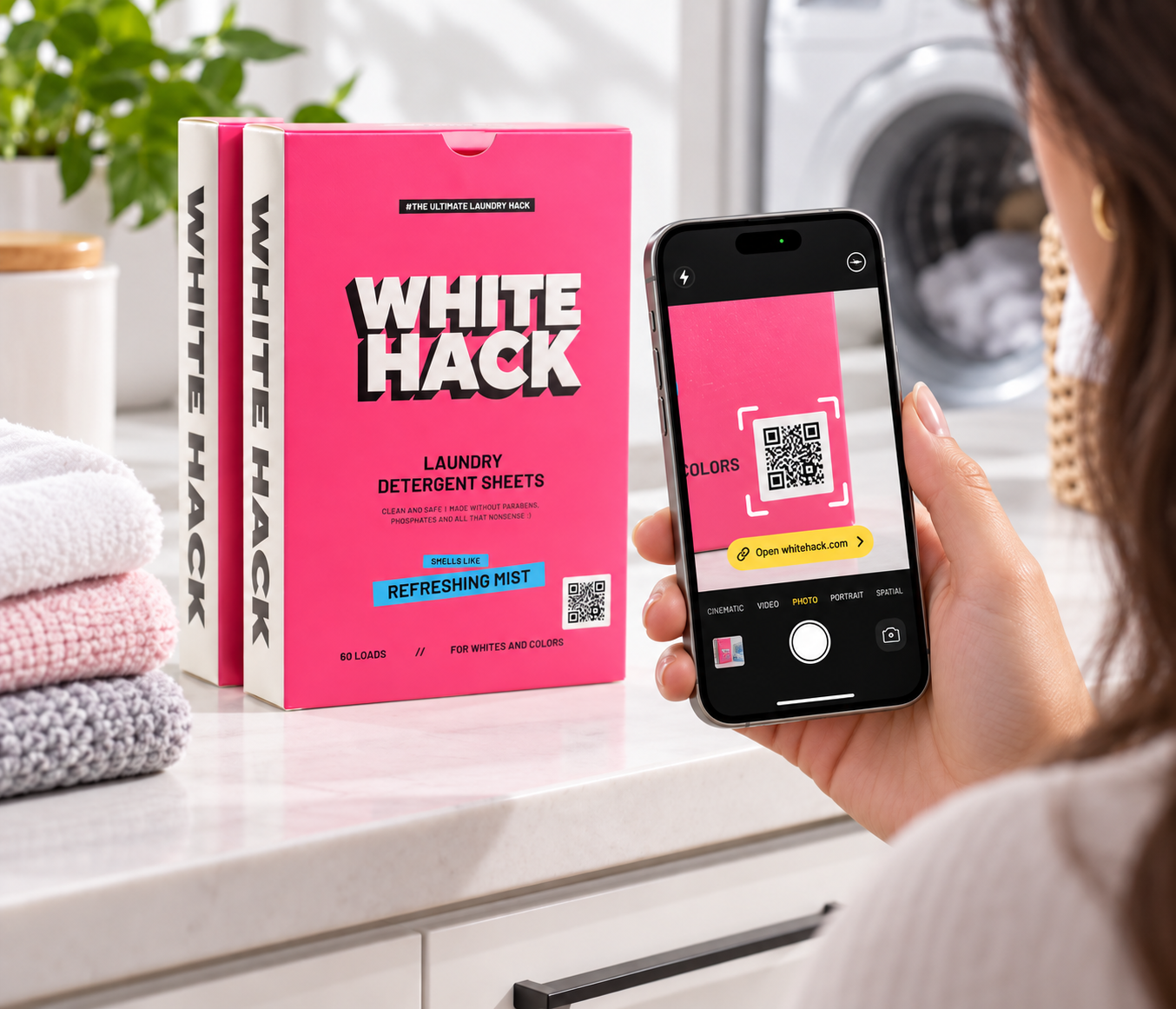 Scanning the QR code on a White Hack box to open Grumpy Bunny